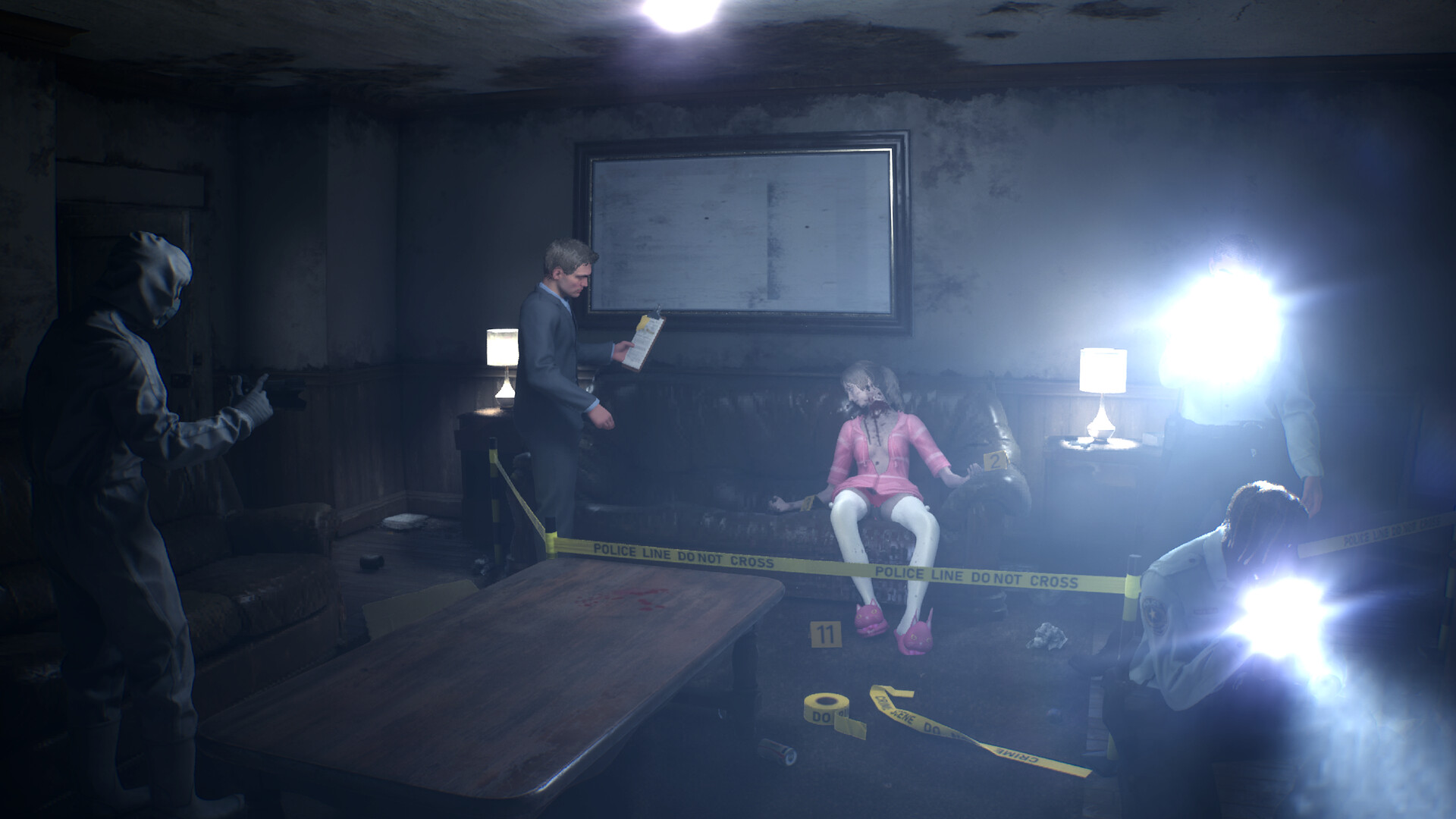 Investigators photograph and document the living-room crime scene.